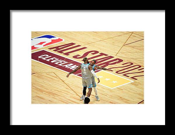 Lebron James Framed Print featuring the photograph Lebron James and Demar Derozan by Emilee Chinn