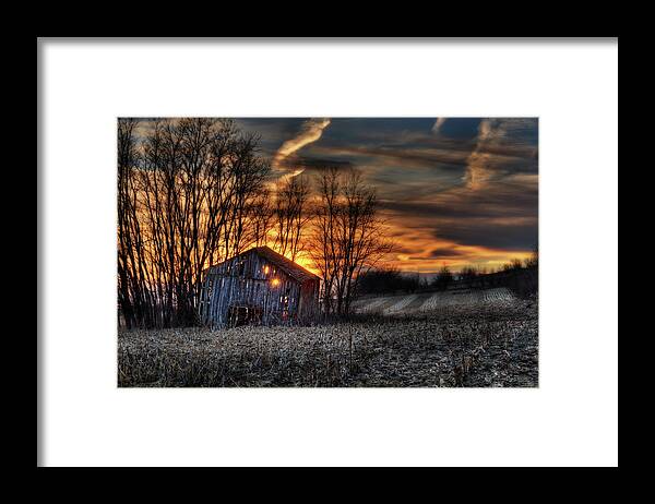 Barn Sunset Light Farm Rural Field Corn Stubble Evening Dusk Landscape Scenic Wi Wisconsin Stoughton Dane Madison Horizontal Orange Haunted Spooky Shed Tobacco Framed Print featuring the photograph Let the Light Shine Through - sunset through collapsing Wisconsin barn by Peter Herman