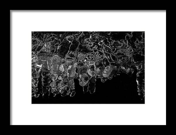 Ice Framed Print featuring the photograph Light in the Darkness by Linda Bonaccorsi