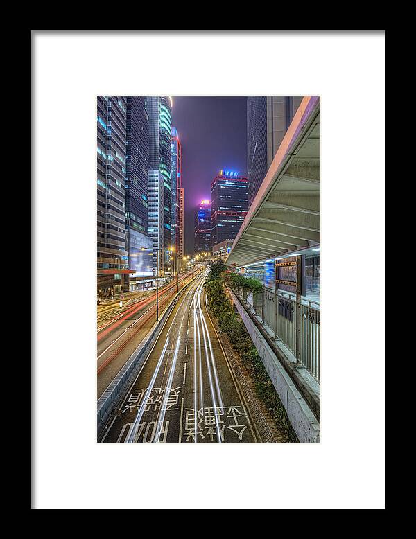 Outdoors Framed Print featuring the photograph Light trails in Central, Hong Kong by Daniel Chui