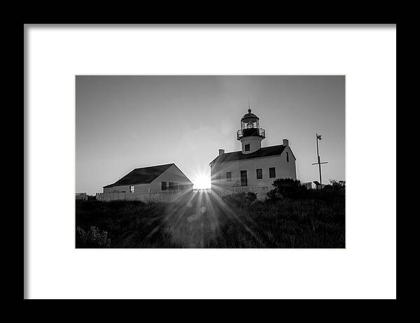 Lighthouse Framed Print featuring the photograph Lighthouse Sun flare by Gina Cinardo