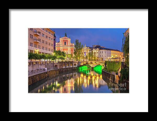 Ljubljana Slovenia Framed Print featuring the photograph Ljubljanica river and the triple bridge at night, Slovenia by Neale And Judith Clark