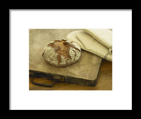 Cutting Board Framed Print featuring the photograph Loaf Of Bread On Butchers Block by T＆I studio