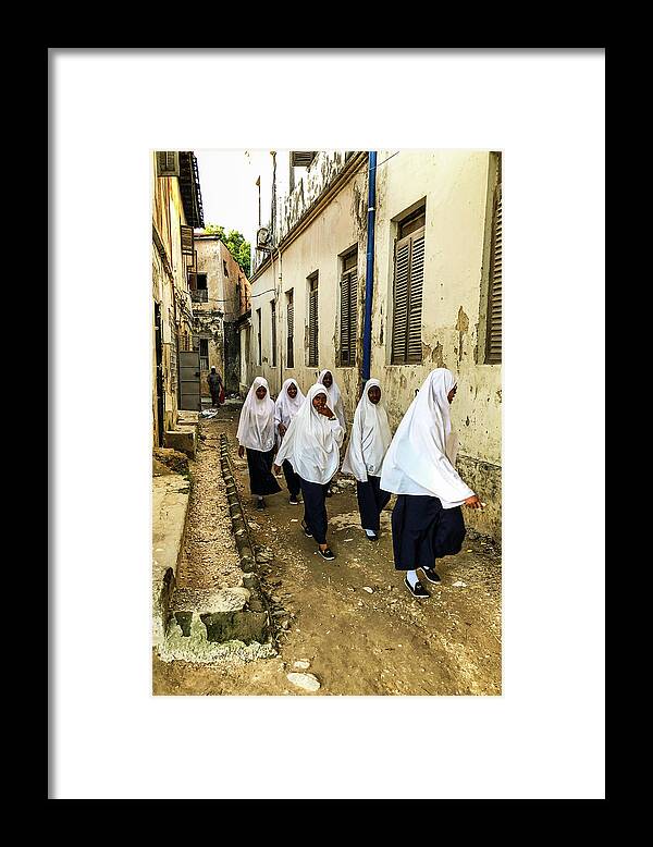 Zanzibar Framed Print featuring the photograph Locals in Stone Town by Matt Cohen