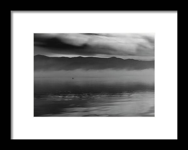 Lake Framed Print featuring the photograph Lonely flight by Ioannis Konstas