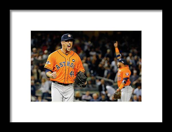Playoffs Framed Print featuring the photograph Luke Gregerson and Luis Valbuena by Al Bello