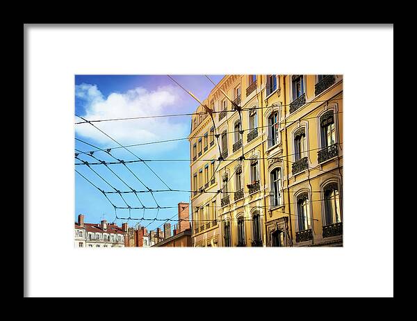 Lyon Framed Print featuring the photograph Lyon France Through a Web of Tram Lines by Carol Japp