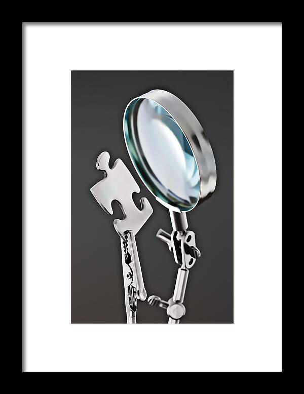 Research Framed Print featuring the photograph Magnifying Glass And Puzzle Piece by David Muir