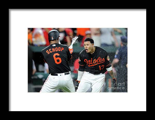 Three Quarter Length Framed Print featuring the photograph Manny Machado and Jonathan Schoop by Greg Fiume