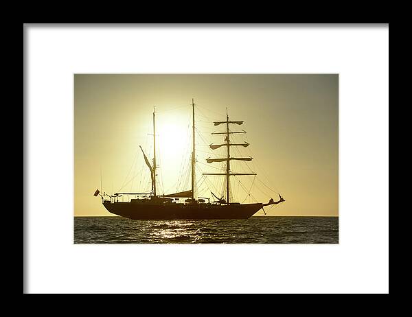 Republic Of Ecuador Framed Print featuring the photograph Mary Anne at sunset, Isabela Island, Galapagos Islands, Ecuador by Kevin Oke