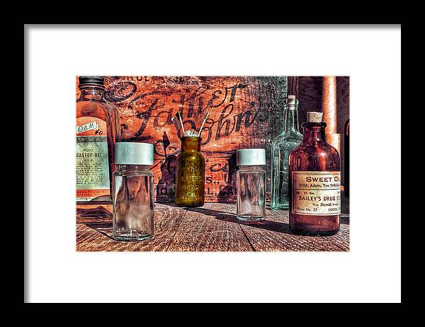 Photo Framed Print featuring the photograph Medicine Bottles by Anthony M Davis