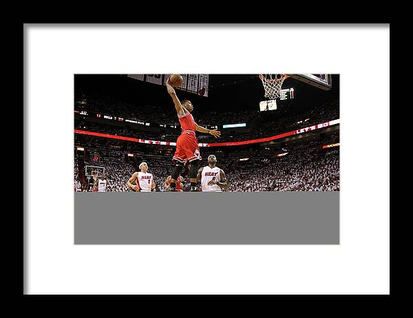 Chicago Bulls Framed Print featuring the photograph Mike Bibby, Derrick Rose, and Lebron James by Mike Ehrmann