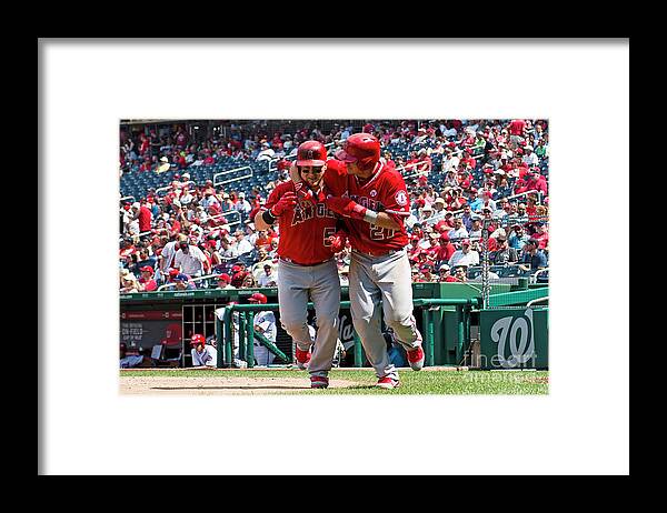 People Framed Print featuring the photograph Mike Trout and Kole Calhoun by Patrick Mcdermott