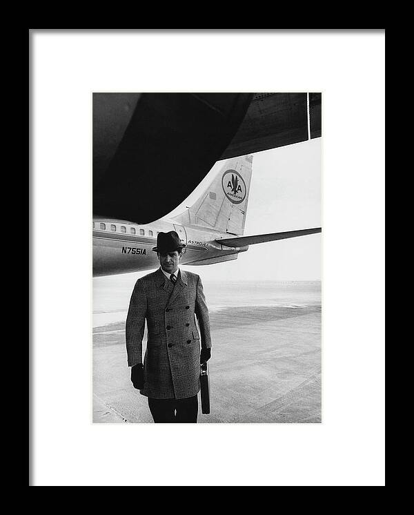 Fashion Framed Print featuring the photograph Model on Tarmac With Airplane by Zachary Freyman