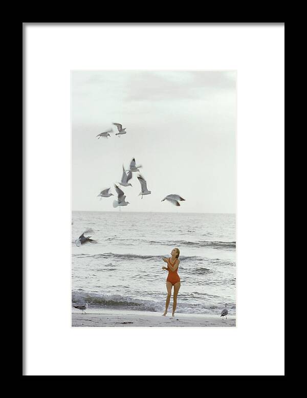 Fashion Framed Print featuring the photograph Model on the Beach in a Jantzen Bathing Suit by Bert Stern