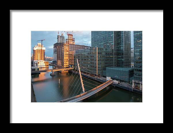 Canary Wharf Framed Print featuring the photograph Modern office building in the Canary Wharf financial centre in the evening. London united kingdom by Michalakis Ppalis