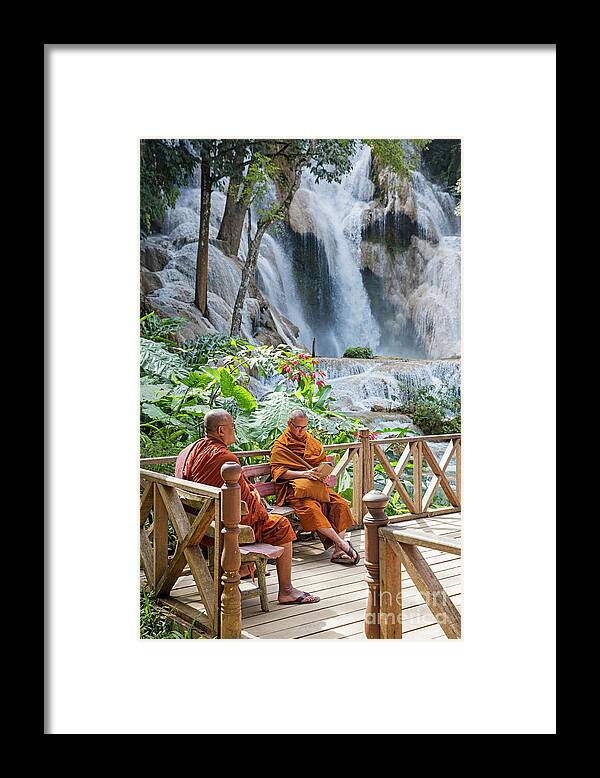 Kuang Si Framed Print featuring the photograph Monks at the Kuang Si Falls, Laos by Arterra Picture Library
