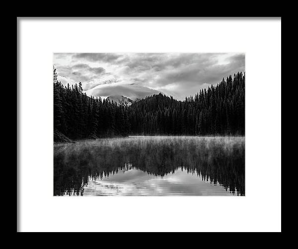 Moody Black And White Lake Reflection Framed Print featuring the photograph Moody Black And White Lake Reflection by Dan Sproul