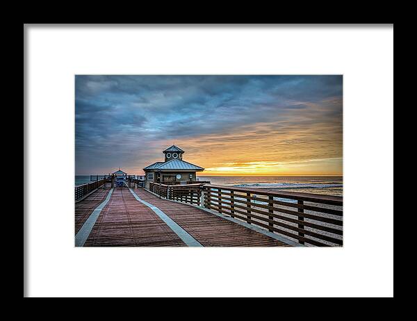 Clouds Framed Print featuring the photograph Morning Light at the Juno Beach Pier by Debra and Dave Vanderlaan