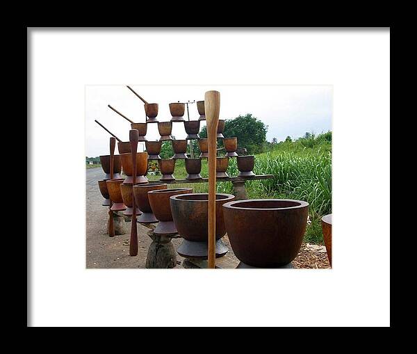 Mortal And Pestle In My Community To Pound Yam(bode Saadu Framed Print featuring the photograph Mortal and pestle by Emmanuel Ogundipe