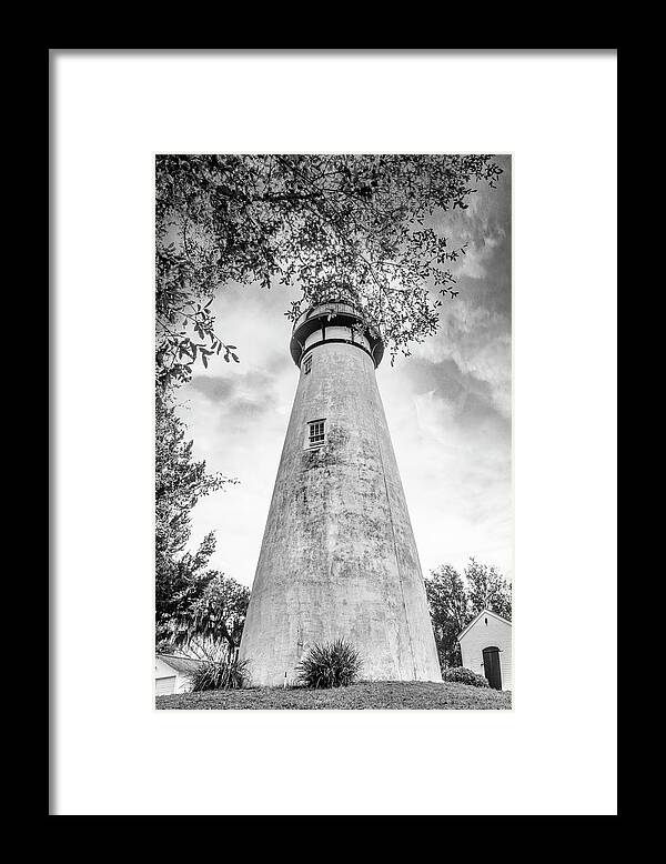 Black Framed Print featuring the photograph Mossy Trees around the Amelia Island Lighthouse Black and White by Debra and Dave Vanderlaan