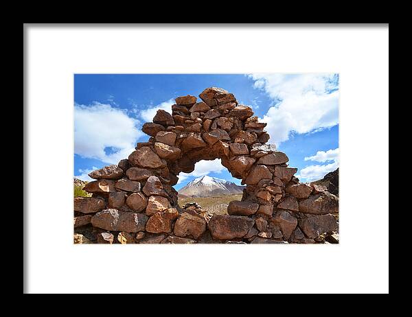 Bolivia Framed Print featuring the photograph Mountain through the stones Bolivia by Ichauvel
