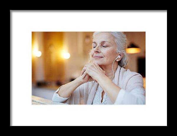 Mature Adult Framed Print featuring the photograph Music for relax by Shironosov