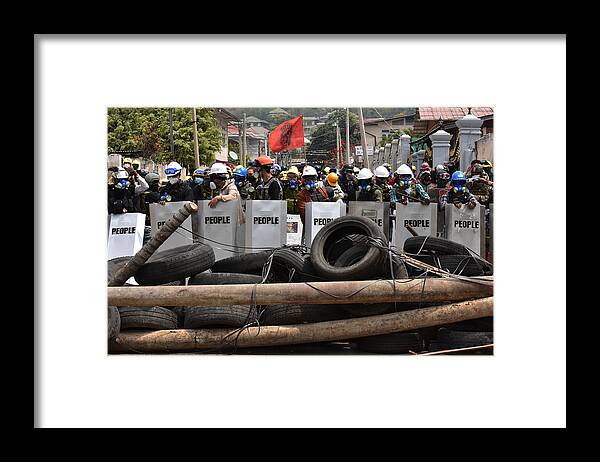 Myanmar Framed Print featuring the photograph Myanmar protests against the military dictatorship by Robert Bociaga