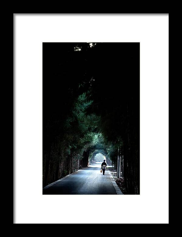 China Framed Print featuring the photograph Naxi Woman in the Tunnel of Trees by Mark Gomez