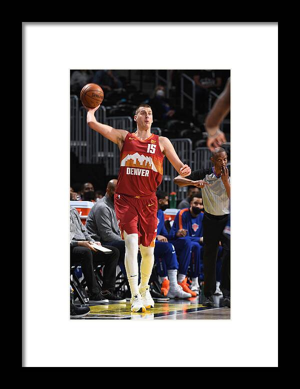 Nikola Jokic Framed Print featuring the photograph New York Knicks v Denver Nuggets by Garrett Ellwood