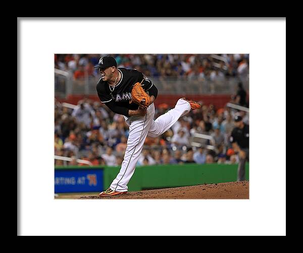 People Framed Print featuring the photograph New York Mets v Miami Marlins by Mike Ehrmann