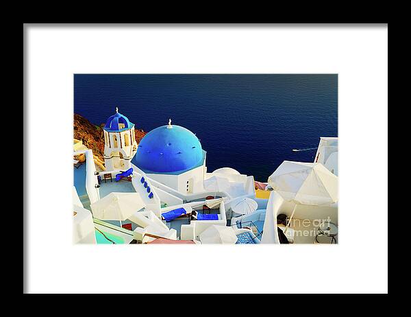 Santorini Framed Print featuring the photograph Oia, traditional greek village portrait by Anastasy Yarmolovich