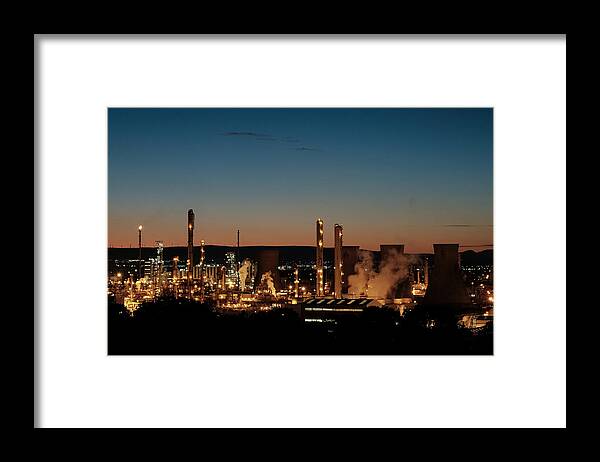 Refinery Framed Print featuring the photograph Oil refinery at dusk by Bob Last