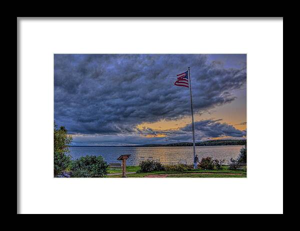 Upnorth Framed Print featuring the photograph Old Glory Over North Twin Lake by Dale Kauzlaric