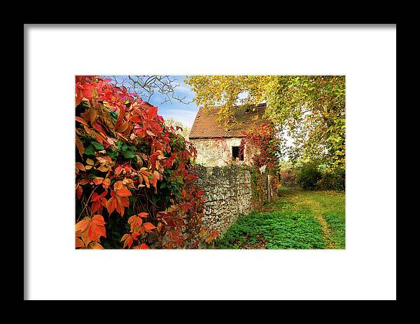 Abandoned Framed Print featuring the photograph Old house and stone fence in autumn by Viktor Wallon-Hars