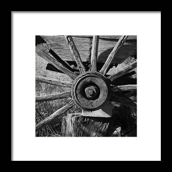 Old Hub And Spokes Framed Print featuring the photograph Old Hub and Spokes by Bill Tomsa
