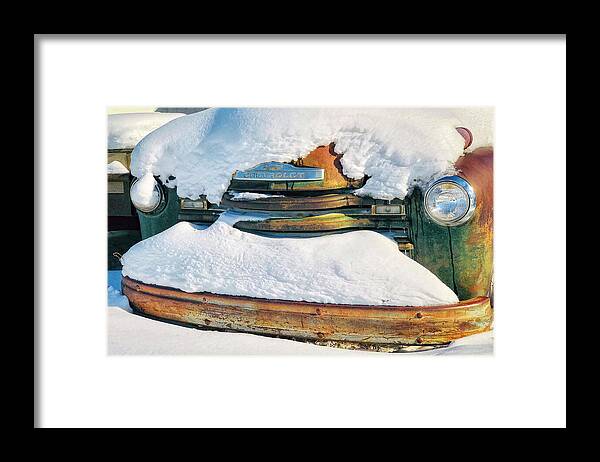 Truck Framed Print featuring the photograph Old rusty truck covered by snow by Tatiana Travelways
