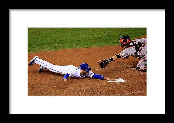 People Framed Print featuring the photograph Omar Infante and Buster Posey by Jamie Squire