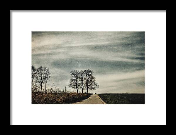 On The Road Framed Print featuring the photograph On the road by Yasmina Baggili