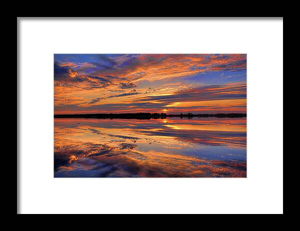 Mead Framed Print featuring the photograph Orange Sunset Over South Rice Lake by Dale Kauzlaric