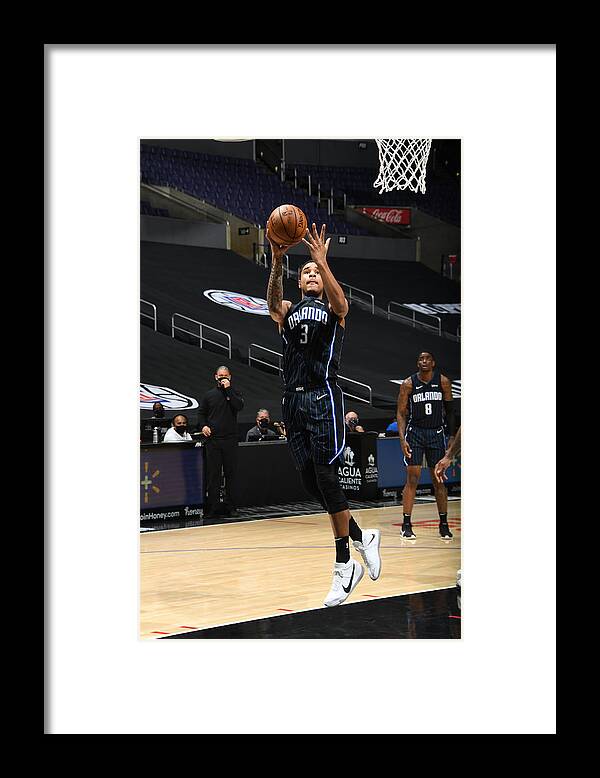 Chuma Okeke Framed Print featuring the photograph Orlando Magic v Los Angeles Clippers by Andrew D. Bernstein