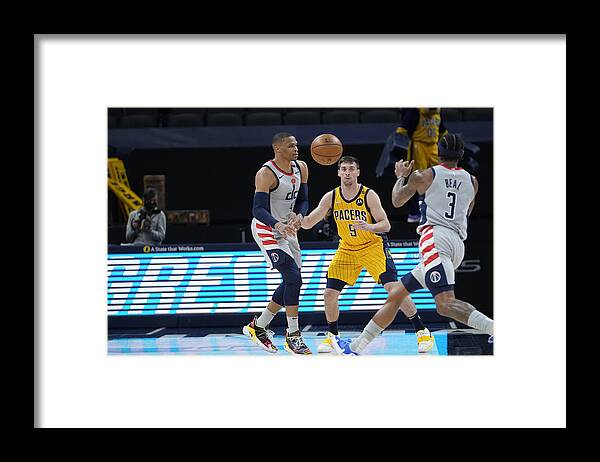 Russell Westbrook Framed Print featuring the photograph Oscar Robertson and Russell Westbrook by A.J. Mast