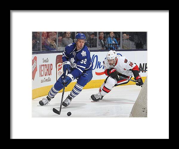 People Framed Print featuring the photograph Ottawa Senators v Toronto Maple Leafs by Claus Andersen