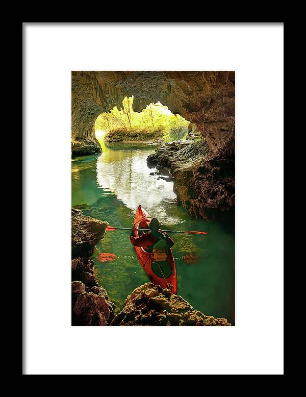 Kayak Framed Print featuring the photograph paddling in Cave Spring by Robert Charity