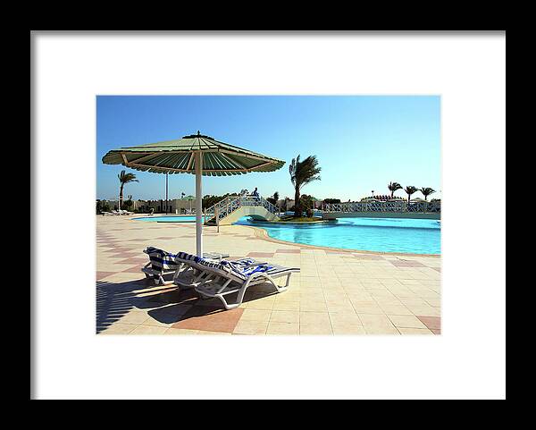 Tree Framed Print featuring the photograph Parasol And Swimming Pool In Hotel by Mikhail Kokhanchikov