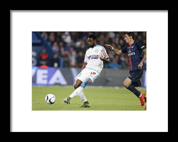 People Framed Print featuring the photograph Paris Saint-Germain v Olympique de Marseille - Ligue 1 by Jean Catuffe