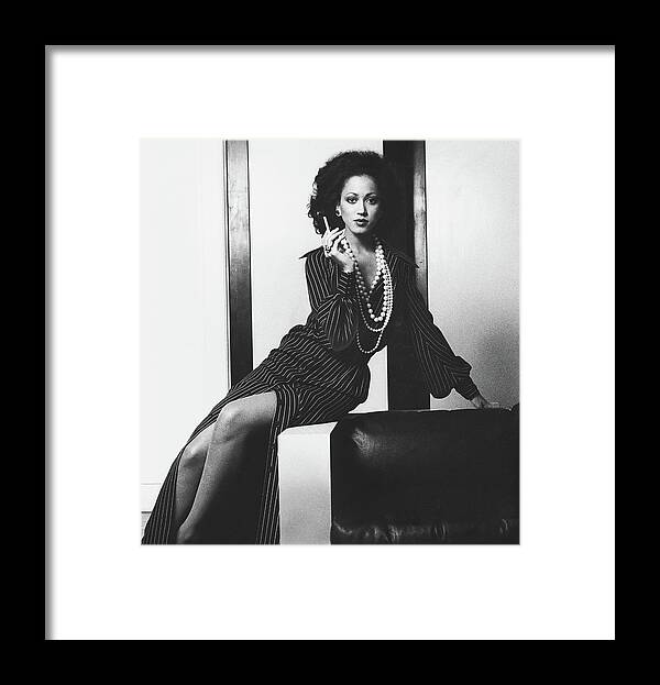 Fashion Framed Print featuring the photograph Pat Cleveland Holding A Cigarette by Bob Stone