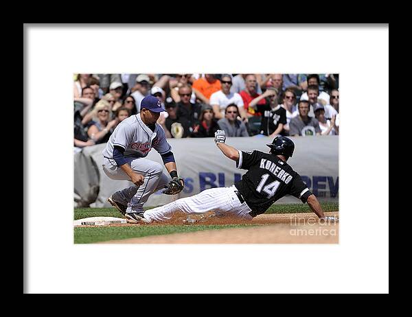 American League Baseball Framed Print featuring the photograph Paul Konerko and Jhonny Peralta by Ron Vesely