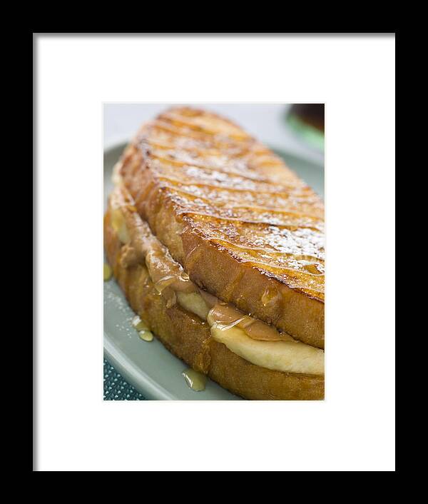 Sugar Framed Print featuring the photograph Peanut Butter And Banana Eggy Bread Sandwich With Syrup by Monkey Business Images