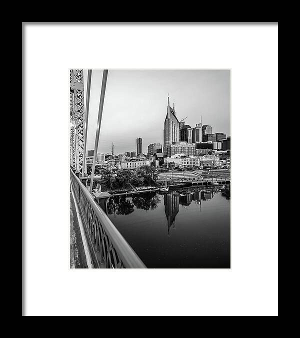 Nashville Skyline Print Framed Print featuring the photograph Pedestrian Bridge View of Nashville - Black and White by Gregory Ballos